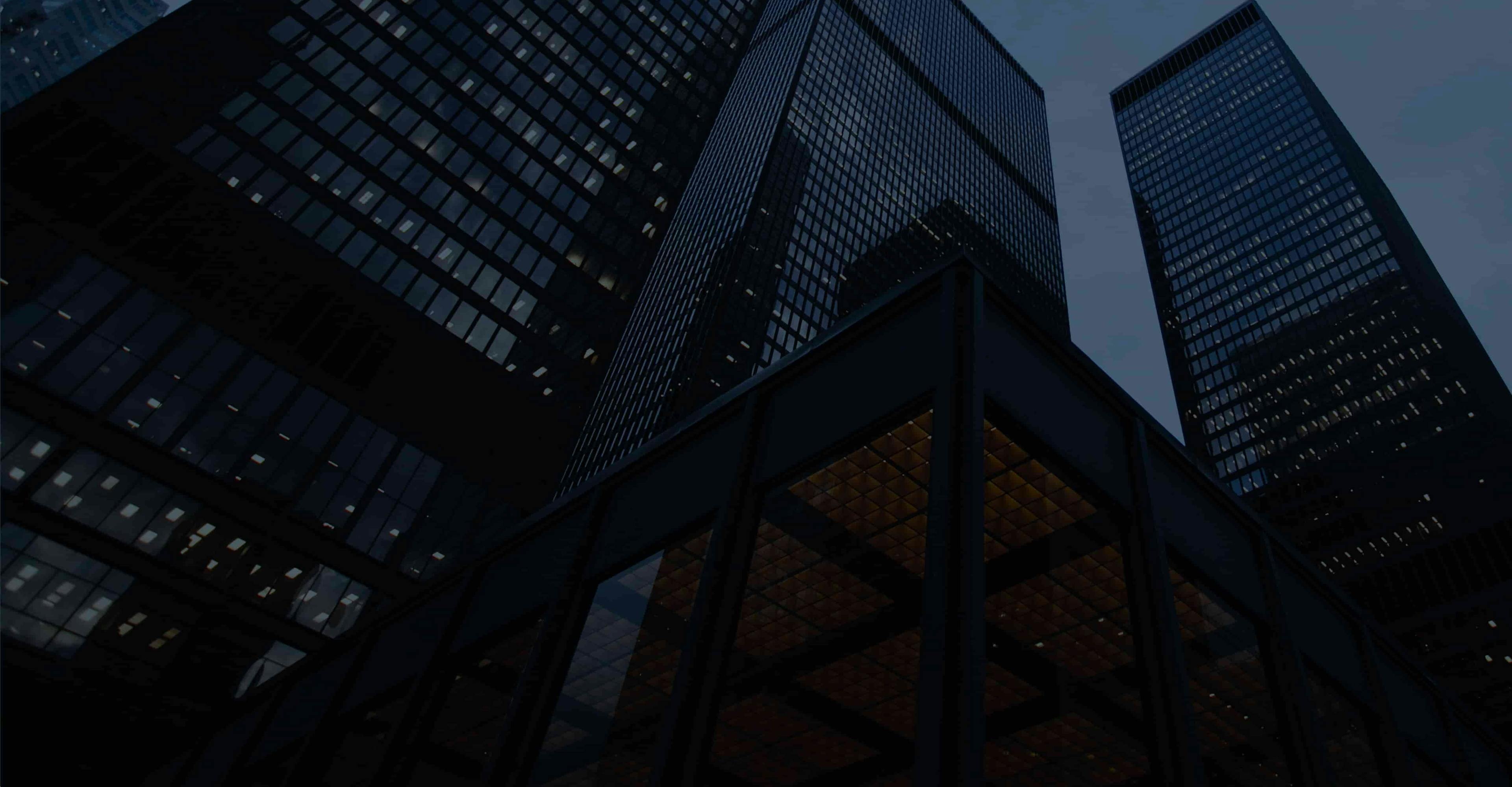 A background image looking up at skyscrapers